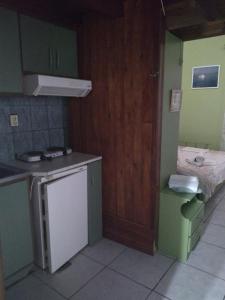 A kitchen or kitchenette at Haus Pigadi Még 37 kép