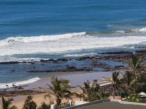 a view of the beach and the ocean at 105 Sea Lodge in Durban