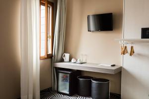 TV a/nebo společenská místnost v ubytování Hotel Cannaregio 2357