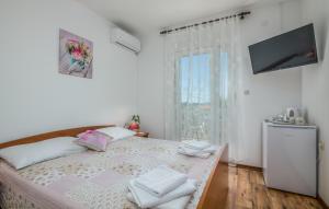 Postel nebo postele na pokoji v ubytování Rooms Valentino + 27 fotografií