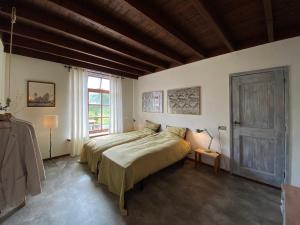 Postel nebo postele na pokoji v ubytování Koningshof