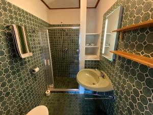 Koupelna v ubytování Koningshof + 17 fotografií