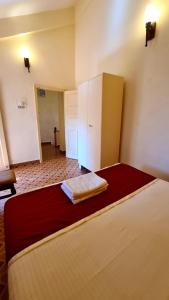 Postel nebo postele na pokoji v ubytování Ruby Apartments 4