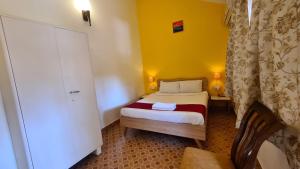 Postel nebo postele na pokoji v ubytování Ruby Apartments 4
