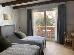 Maison d'hôtes Ermitage客房内的一张或多张床位
