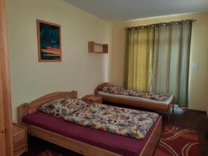 Posteľ alebo postele v izbe v ubytovaní Ponty Orsó Vendégház + 21 fotografií