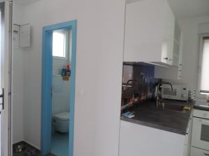 Kuchyň nebo kuchyňský kout v ubytování PALMandre (Pag Apartment Luxurious)