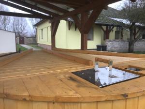 a deck being built on a house at Korcsetta Vendégház in Dávod +15 photos