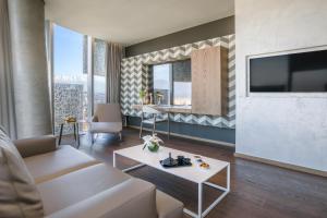 TV a/nebo společenská místnost v ubytování Maritim Hotel Plaza Tirana