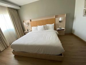 Letto o letti in una camera di Radisson Colon 2,000 Hotel & Casino