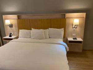 Letto o letti in una camera di Radisson Colon 2,000 Hotel & Casino