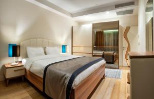 Postel nebo postele na pokoji v ubytování Armoni Residence Istanbul