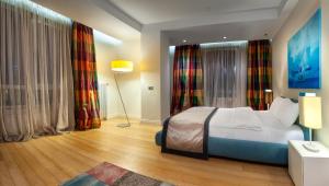 Postel nebo postele na pokoji v ubytování Armoni Residence Istanbul