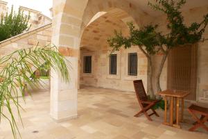 Patio alebo iná vonkajšia časť ubytovania Relais Villa Lucia