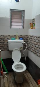 Koupelna v ubytování Sakshi Home Stay