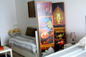 Postel nebo postele na pokoji v ubytování Madeira Native Motion Guest House