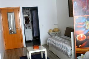 Postel nebo postele na pokoji v ubytování Madeira Native Motion Guest House