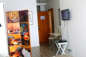 TV a/nebo společenská místnost v ubytování Madeira Native Motion Guest House