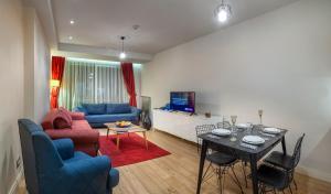 TV a/nebo společenská místnost v ubytování Armoni Residence Istanbul