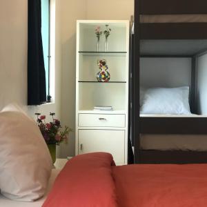 Postel nebo postele na pokoji v ubytování Anhembi Hostel