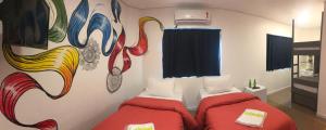 Postel nebo postele na pokoji v ubytování Anhembi Hostel