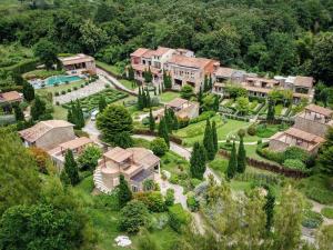 an aerial view of a mansion with a yard at La Toscana in Suan Phung