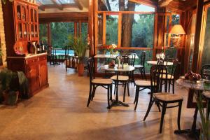 Um restaurante ou outro lugar para comer em Casa Glebinias