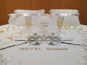 Postel nebo postele na pokoji v ubytování Hotel Dunas d'Ovar
