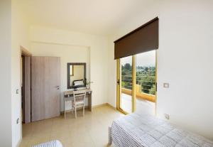 A bed or beds in a room at Stelia Luxury apartments
