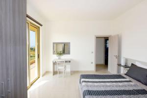 A television and/or entertainment centre at Stelia Luxury apartments