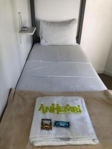 Postel nebo postele na pokoji v ubytování Anhembi Hostel