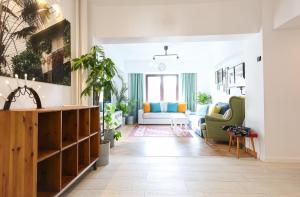 a living room with a couch and a table at Diana's Flat-Bucharest - Old City in Bucharest