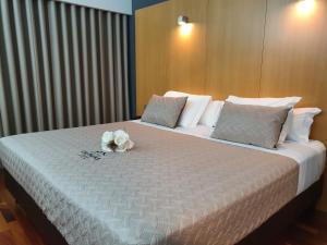 Postel nebo postele na pokoji v ubytování Hotel Dunas d'Ovar