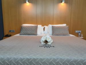 Postel nebo postele na pokoji v ubytování Hotel Dunas d'Ovar