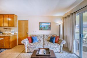 a living room with a couch and a table at Kihei Kai 12 in Kihei