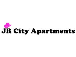 a pink hat and the words hr city apartments at Seaside Guesthouse by JR City Apartments in Jadranovo