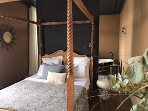 Ein Bett oder Betten in einem Zimmer der Unterkunft Villa Louisa