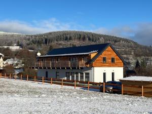 Afbeelding uit fotogalerij van Apartmány Na šumavské louce in Stachy