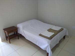 Postel nebo postele na pokoji v ubytování Pousada Sol de Minas