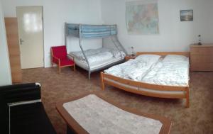 Postel nebo postele na pokoji v ubytování Apartmán Saxán Smržovka