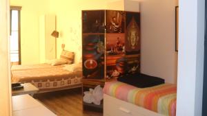 Postel nebo postele na pokoji v ubytování Madeira Native Motion Guest House