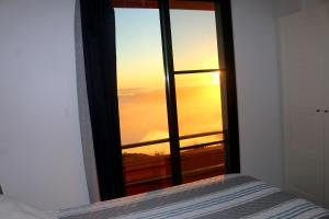 Postel nebo postele na pokoji v ubytování Madeira Native Motion Guest House