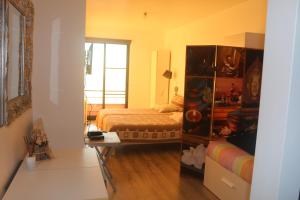 Postel nebo postele na pokoji v ubytování Madeira Native Motion Guest House
