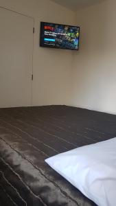 Postel nebo postele na pokoji v ubytování Arena Motel