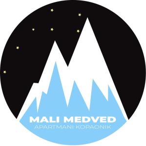 a mountain logo with a moon and stars at Mali Medved Konaci in Kopaonik