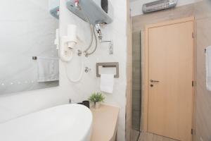Kúpeľňa v ubytovaní Apartmani Rišpet