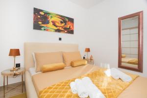 Posteľ alebo postele v izbe v ubytovaní Apartmani Rišpet