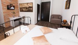 Postel nebo postele na pokoji v ubytování Prior Suites Split