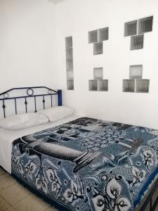 Postel nebo postele na pokoji v ubytování Hostal Maple