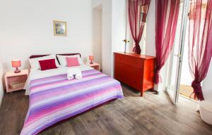 Postel nebo postele na pokoji v ubytování Prior Suites Split